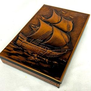 Vintage copper look  embossed ship  confectionery tin  with faux wood look